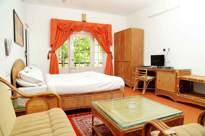 Imagen de la habitación del Hotel Vythiri Greens Resort. Foto 19