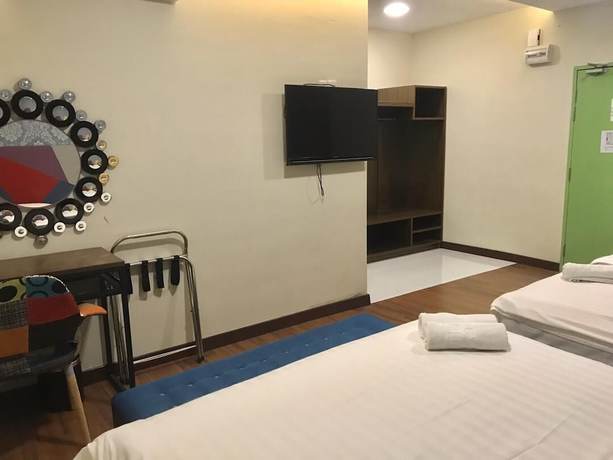 Imagen de la habitación del Hotel W Cemerlang. Foto 6