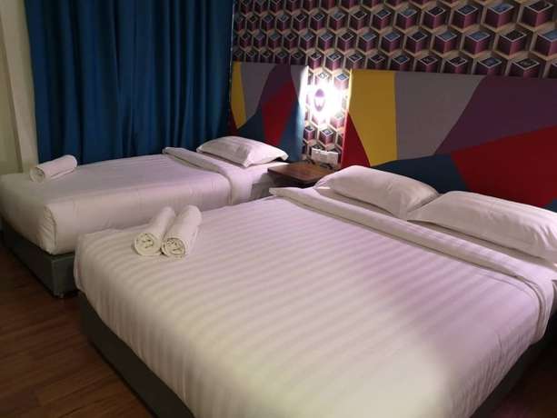 Imagen de la habitación del Hotel W Cemerlang. Foto 7