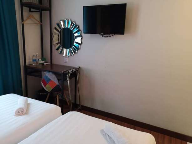 Imagen de la habitación del Hotel W Cemerlang. Foto 11