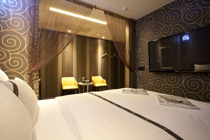Imagen de la habitación del Hotel W. Foto 18