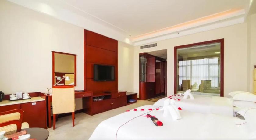 Imagen de la habitación del Hotel WANJIAHAO (NANJING) INTERNATIONAL. Foto 14