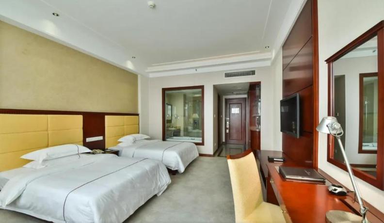 Imagen de la habitación del Hotel WANJIAHAO (NANJING) INTERNATIONAL. Foto 16