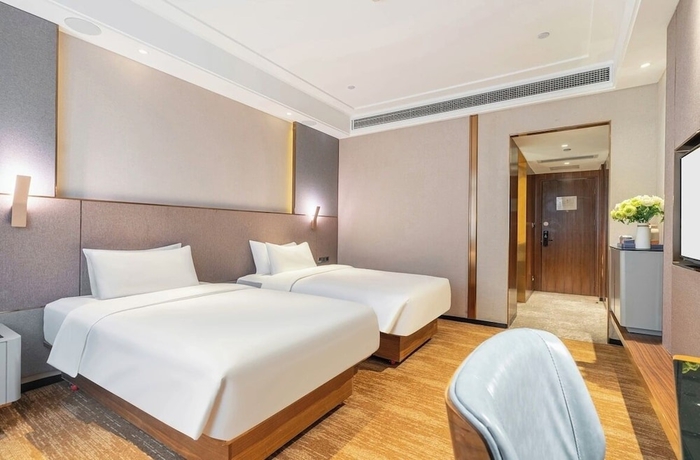 Imagen de la habitación del Hotel WANJIN HOTEL-Yongbin Overpass Subway. Foto 8