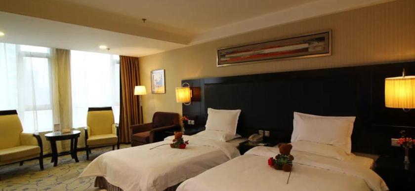 Imagen de la habitación del Hotel WANSHANG INTERNATIONAL HOTEL. Foto 6