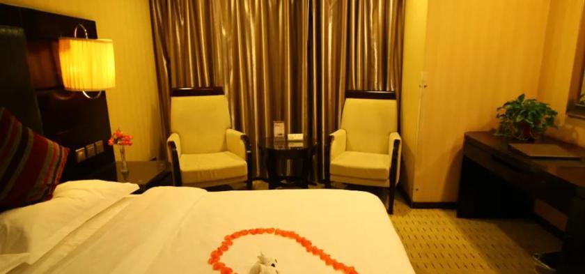 Imagen de la habitación del Hotel WANSHANG INTERNATIONAL HOTEL. Foto 7