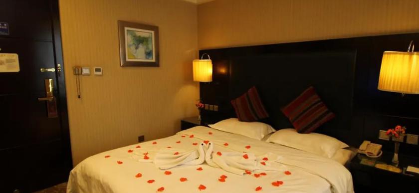 Imagen de la habitación del Hotel WANSHANG INTERNATIONAL HOTEL. Foto 13