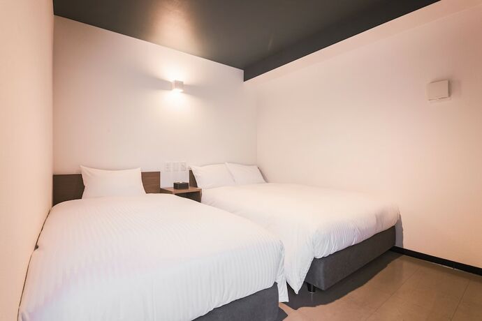 Imagen de la habitación del Hotel WAYFARER Shinsaibashi. Foto 18