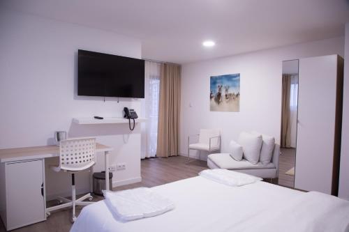 Imagen de la habitación del Hotel WDC APARTHOTEL - BUEA. Foto 13