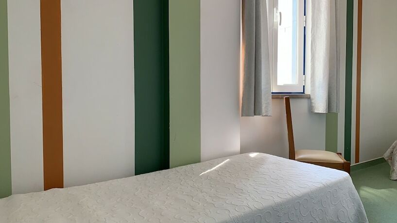 Imagen de la habitación del Hotel WEAA. Foto 11