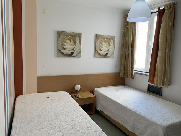 Imagen de la habitación del Hotel WEAA. Foto 15