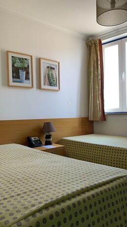 Imagen de la habitación del Hotel WEAA. Foto 17