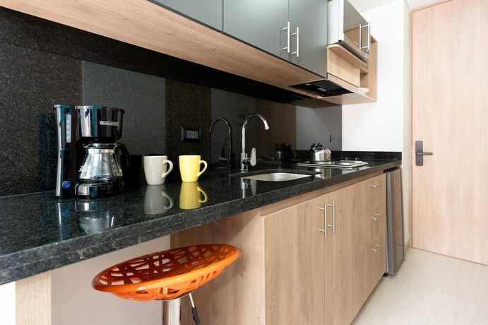 Imagen de la habitación del Hotel WEEKI. Foto 19