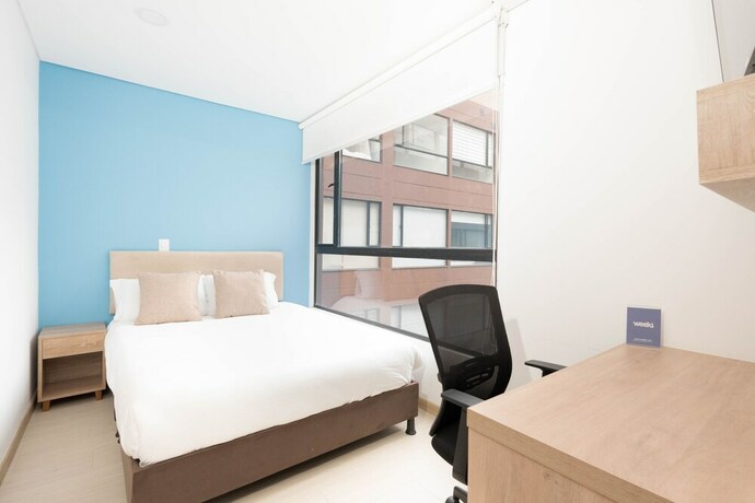 Imagen de la habitación del Hotel WEEKI. Foto 20