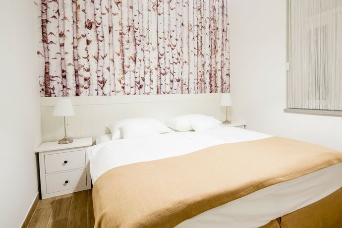 Imagen de la habitación del Hotel WH Apartments. Foto 20