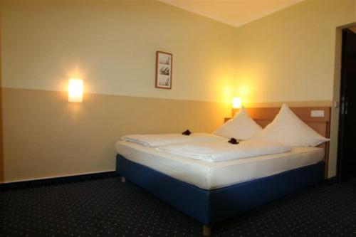 Imagen de la habitación del Hotel WH Hotels Papenburg Zentrum. Foto 7