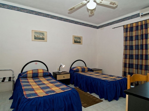 Imagen de la habitación del Hotel WHITE DOLPHIN HOLIDAY COMPLEX. Foto 6