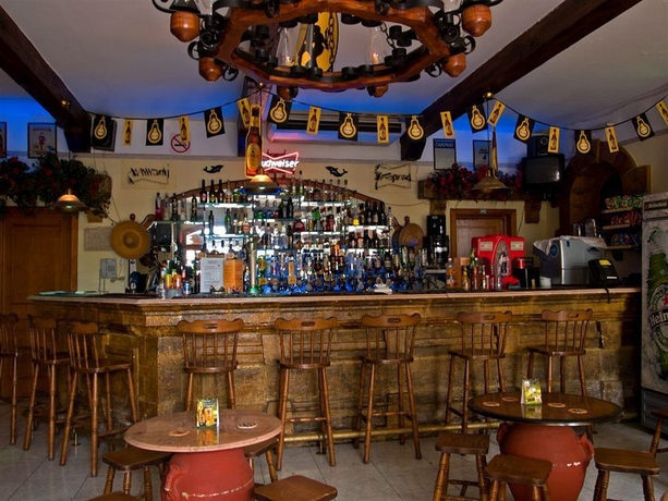 Imagen del bar/restaurante del Hotel WHITE DOLPHIN HOLIDAY COMPLEX. Foto 4