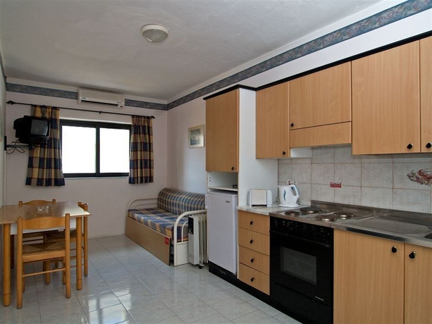 Imagen de la habitación del Hotel WHITE DOLPHIN HOLIDAY COMPLEX. Foto 7