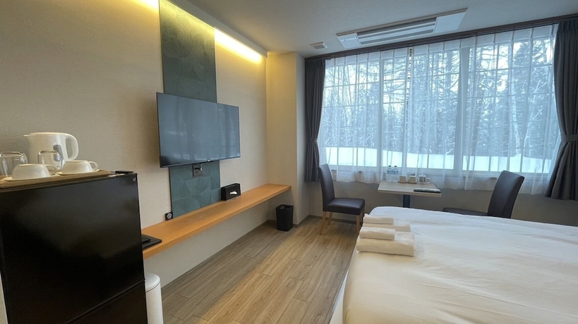 Imagen de la habitación del Hotel WHITE HOTEL GRAND HAKUBA. Foto 11