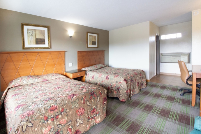 Imagen de la habitación del Hotel WHITEHOUSE MOTEL. Foto 9