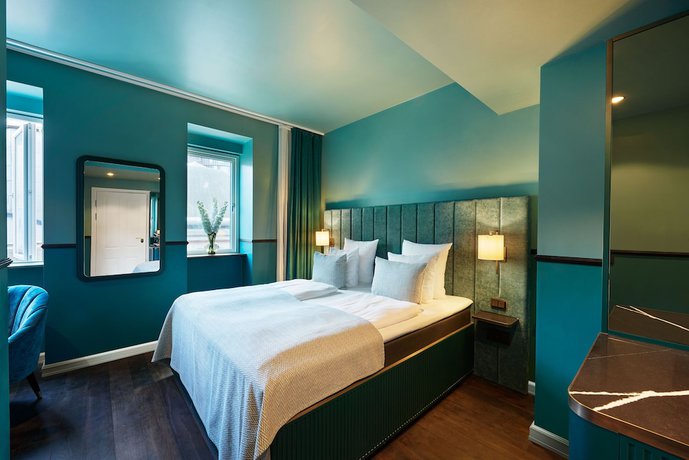 Imagen de la habitación del Hotel WIDE. Foto 7