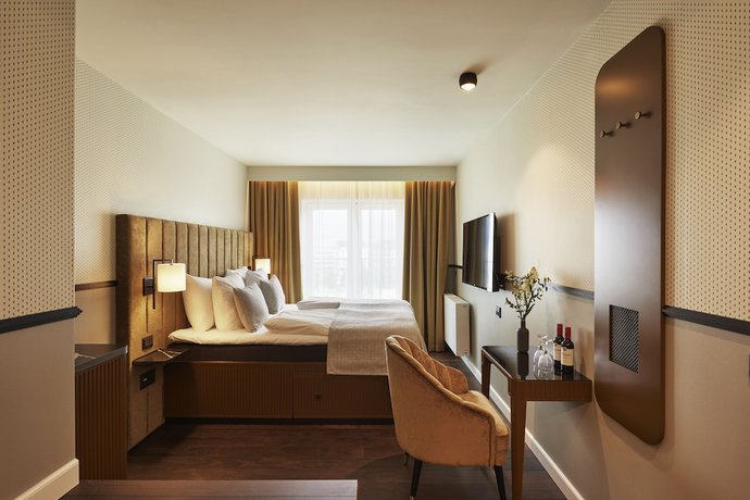 Imagen de la habitación del Hotel WIDE. Foto 11