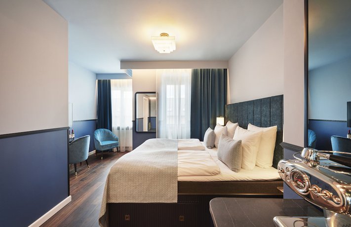 Imagen de la habitación del Hotel WIDE. Foto 16