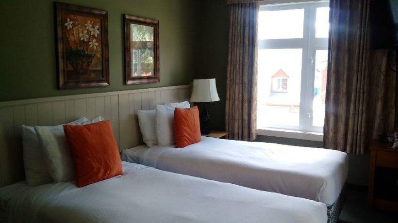 Imagen de la habitación del Hotel WINDTOWER LODGE & SUITES. Foto 14