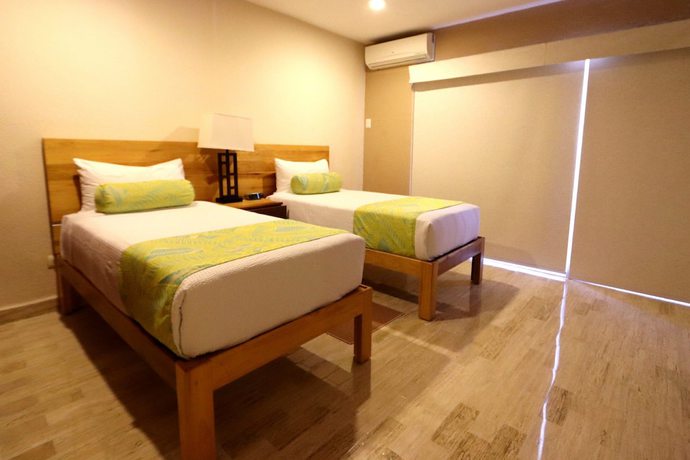 Imagen de la habitación del Hotel WIVC Coral Mar Resort- Amazing Zone and Lagoon Views, Enjoy the Tropical Breeze. Foto 8