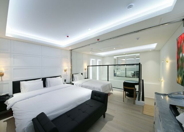 Imagen de la habitación del Hotel WJ HOTEL POOL HOUSE. Foto 12