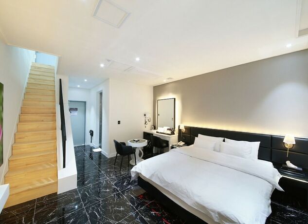 Imagen de la habitación del Hotel WJ HOTEL POOL HOUSE. Foto 13