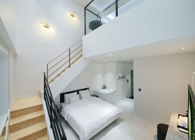 Imagen de la habitación del Hotel WJ HOTEL POOL HOUSE. Foto 14