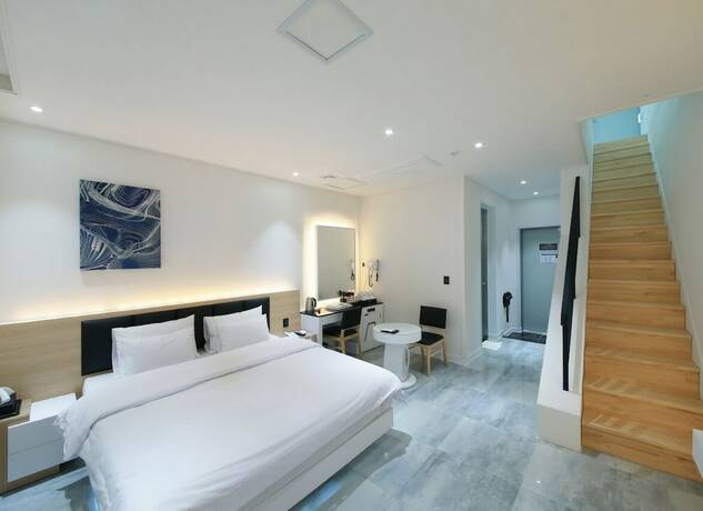 Imagen de la habitación del Hotel WJ HOTEL POOL HOUSE. Foto 15