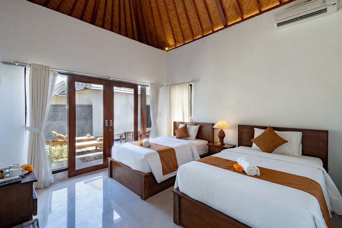 Imagen de la habitación del Hotel WK Gamat Garden. Foto 6