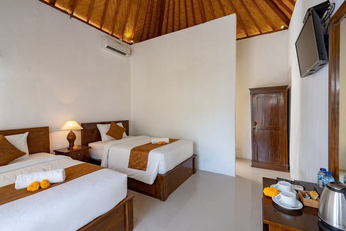 Imagen de la habitación del Hotel WK Gamat Garden. Foto 7