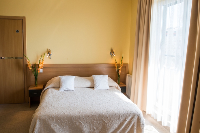 Imagen de la habitación del Hotel WM System. Foto 12