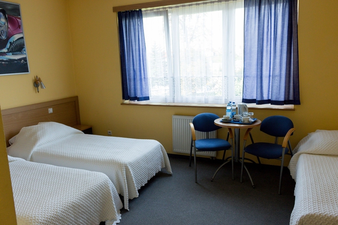 Imagen de la habitación del Hotel WM System. Foto 14