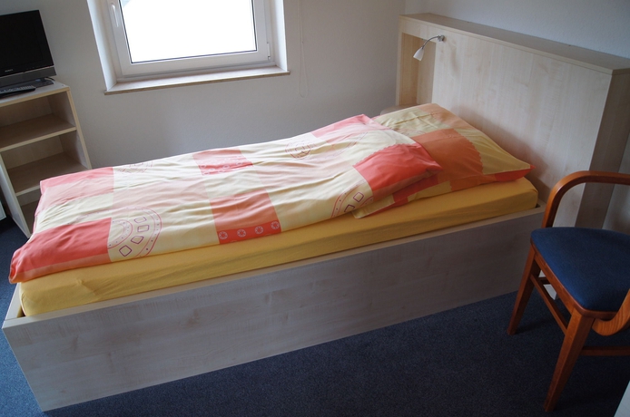Imagen de la habitación del Hotel WOS. Foto 15