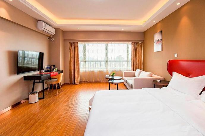 Imagen de la habitación del Hotel WOWQU SERVICE APARTMENTA DALIAN JINZHOU SHENGLI RO. Foto 8