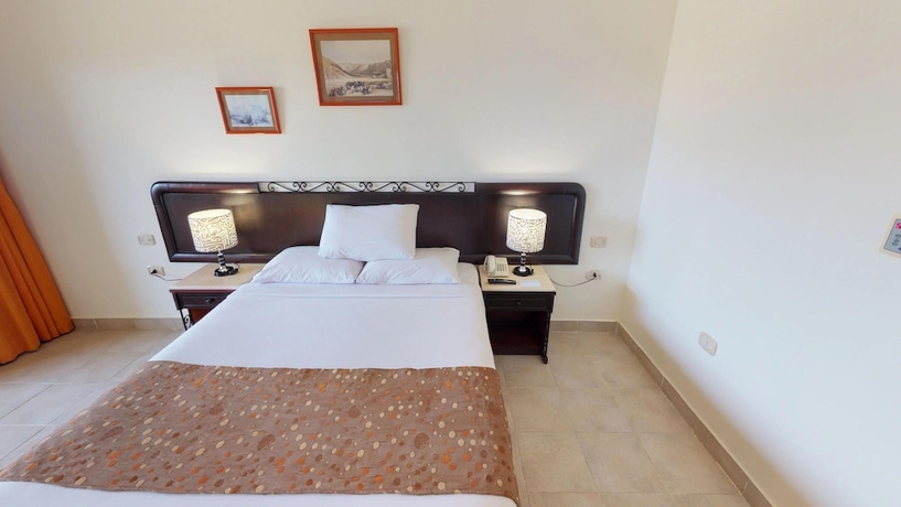 Imagen de la habitación del Hotel Wadi Lahmy Azur Resort. Foto 9