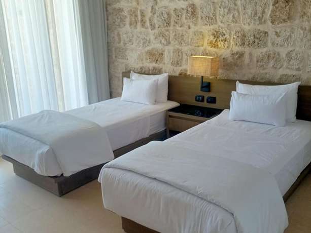 Imagen de la habitación del Hotel Wadi Sabarah Lodge. Foto 8