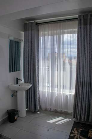 Imagen de la habitación del Hotel Waffles Suites, Nakuru. Foto 14
