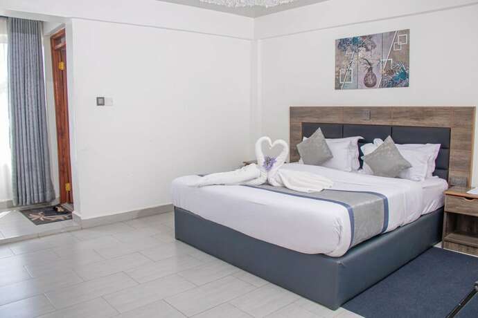 Imagen de la habitación del Hotel Waffles Suites, Nakuru. Foto 16