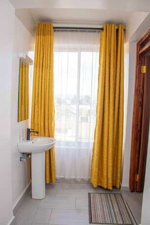 Imagen de la habitación del Hotel Waffles Suites, Nakuru. Foto 17
