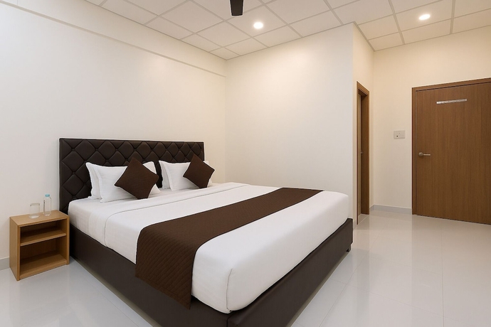 Imagen de la habitación del Hotel Wagheshwari. Foto 5