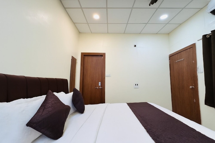 Imagen de la habitación del Hotel Wagheshwari. Foto 9