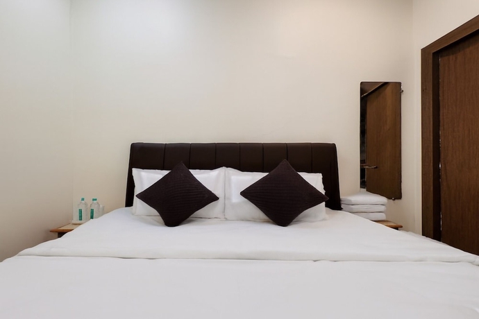 Imagen de la habitación del Hotel Wagheshwari. Foto 10