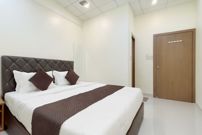Imagen de la habitación del Hotel Wagheshwari. Foto 11