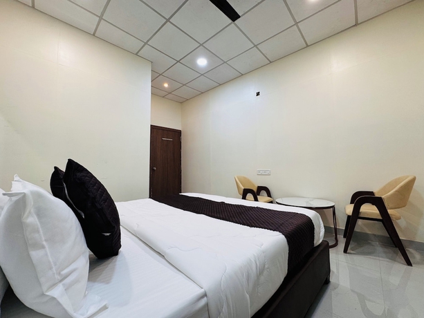 Imagen de la habitación del Hotel Wagheshwari. Foto 12